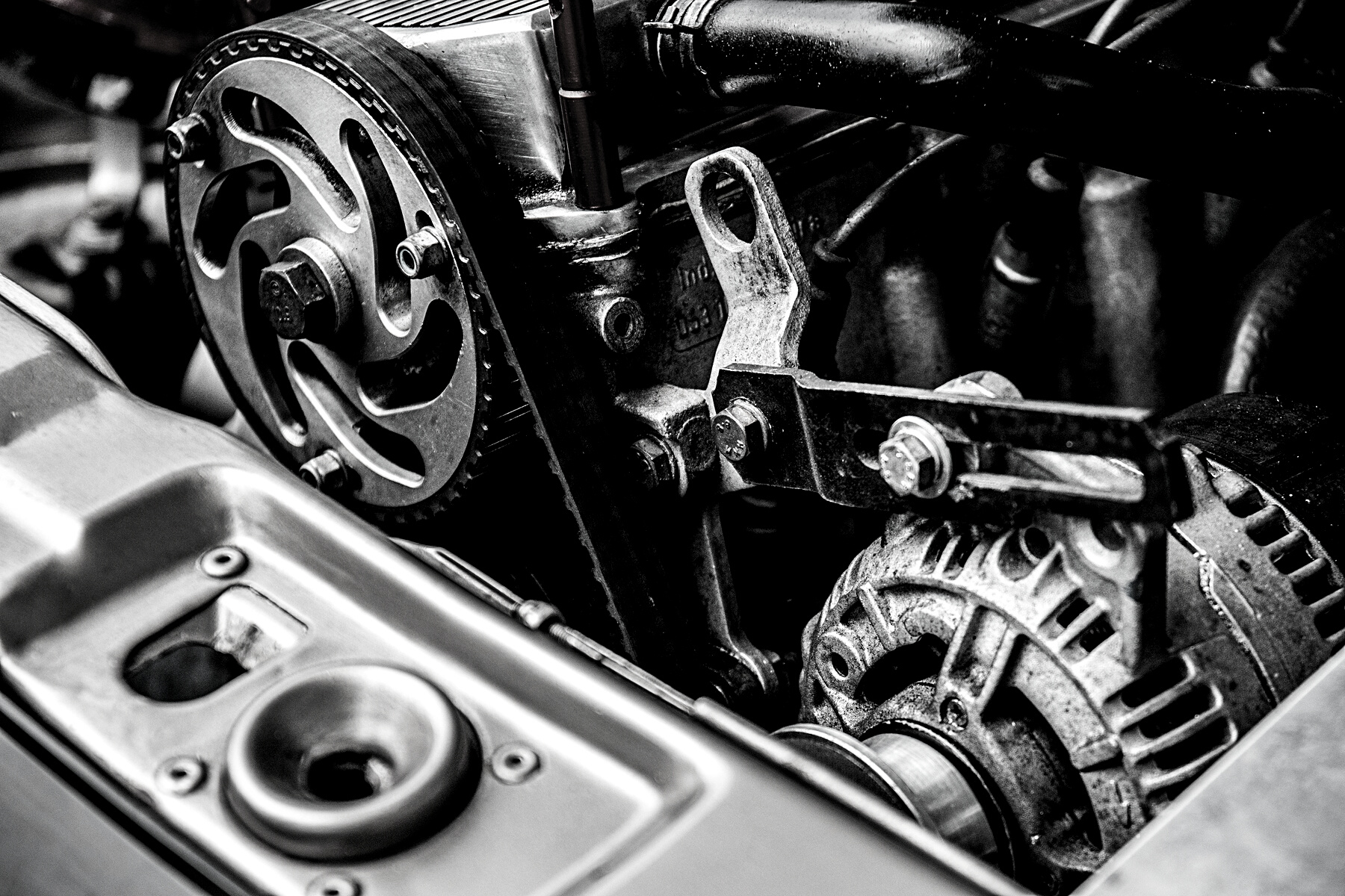 Close-up Photo of Black and Silver Car Engine
